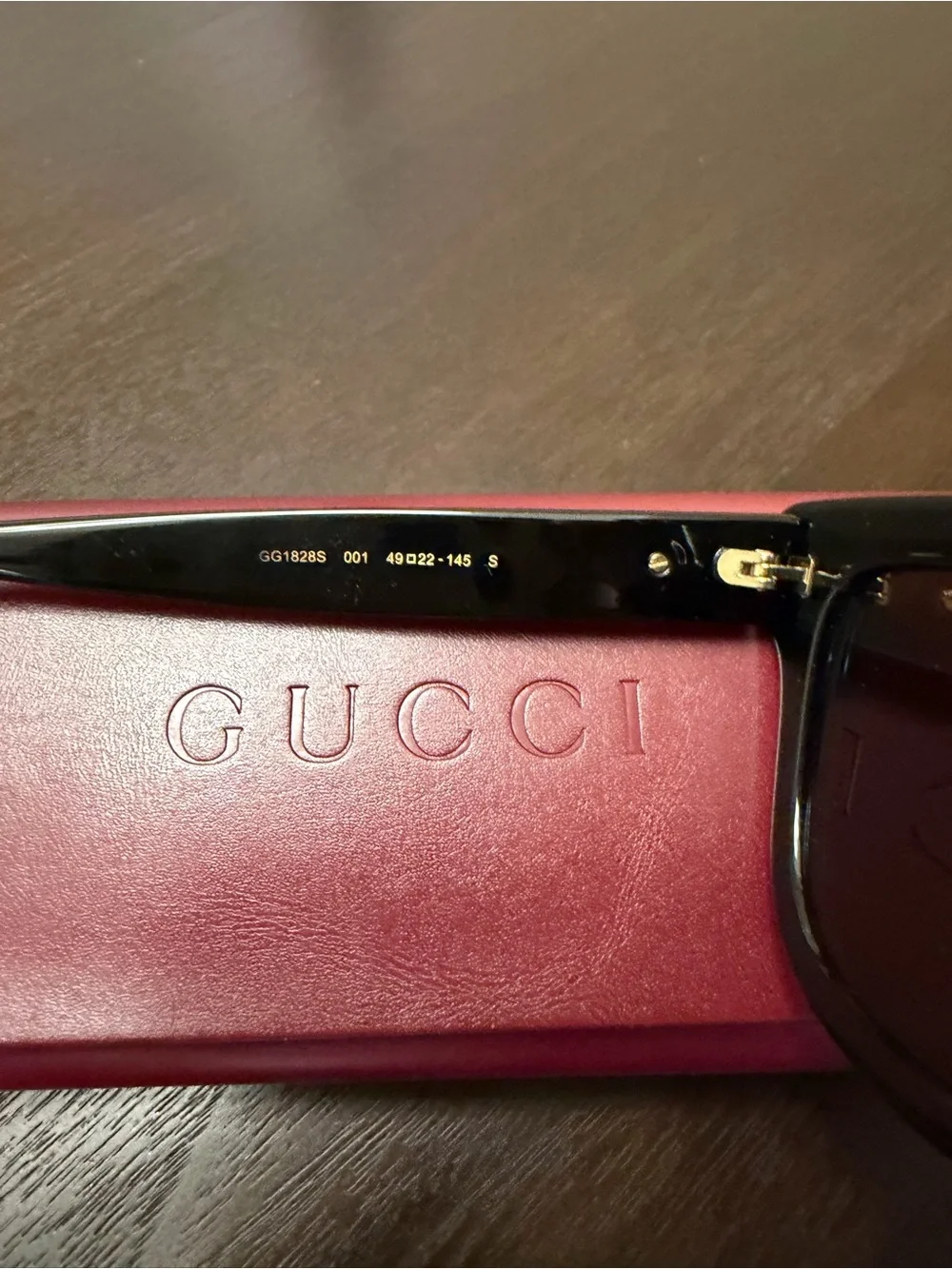 Gucci Black Cat-Eye Women's Sunglasses with Red Logo Case